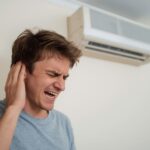 Ar condicionado silencioso: Pessoa incomodada com ar condicionado barulhento!
